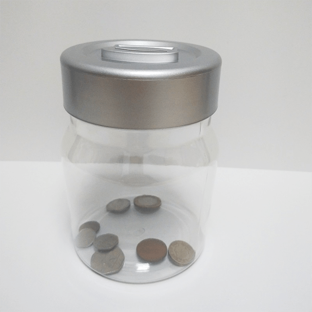 Tirelire transparente comptant un pot de pièces de monnaie pour la promotion